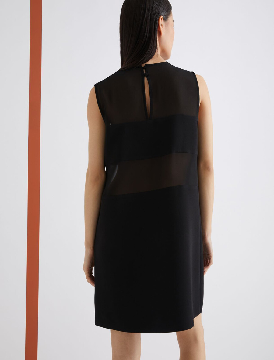 ausgestelltes kleid aus zwei materialien - schwarz