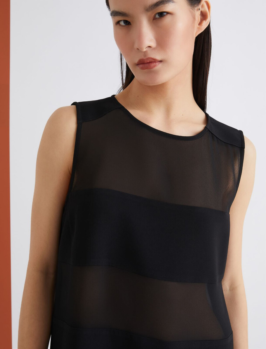 ausgestelltes kleid aus zwei materialien - schwarz
